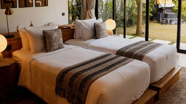 Elite Havens - Villa Nica Bali Indonesia - Twin guest bedroom by the garden